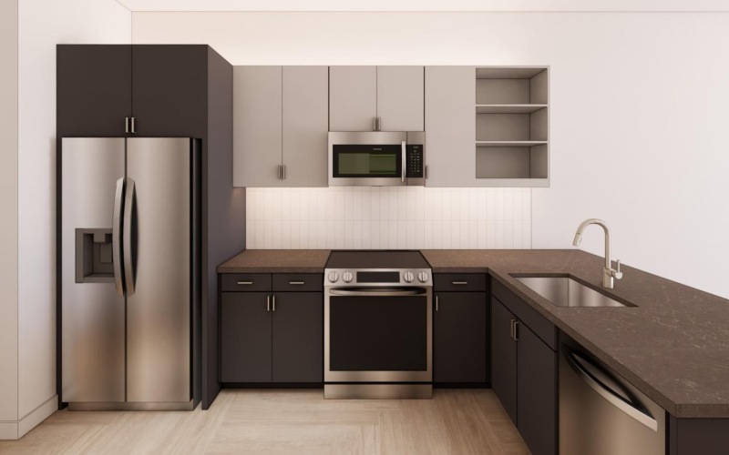 a kitchen with black cabinets